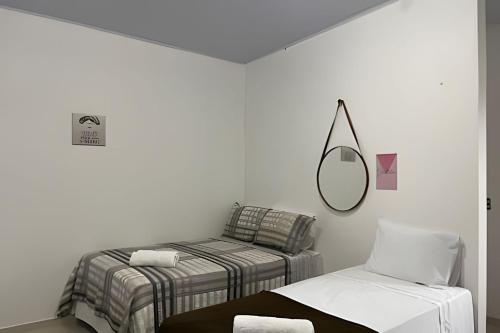 Katil atau katil-katil dalam bilik di Apartamentos Vitória