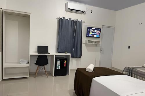 Televisyen dan/atau pusat hiburan di Apartamentos Vitória