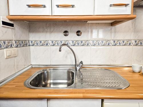Η κουζίνα ή μικρή κουζίνα στο Apartamentos Gavín Biescas 3000