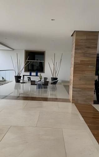 Una televisión o centro de entretenimiento en ¡Escapada Perfecta en la Playa! 1 Habitacion 4 Pax