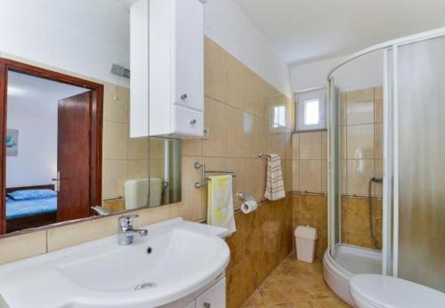 Koupelna v ubytování Apartment Kosta