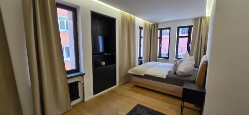 Ένα ή περισσότερα κρεβάτια σε δωμάτιο στο Room16-Ulm