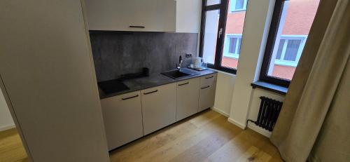Η κουζίνα ή μικρή κουζίνα στο Room16-Ulm