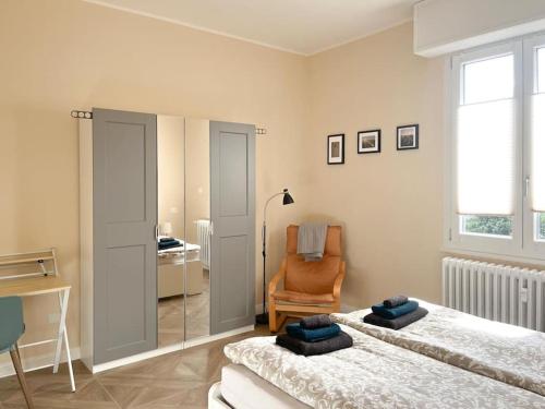 Postel nebo postele na pokoji v ubytování Casa Fortuna - erste Seelage - fantastischer Seesicht - alles fussläufig erreichbar