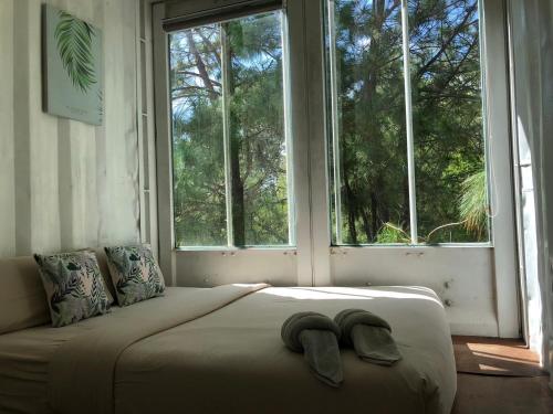 Ένα ή περισσότερα κρεβάτια σε δωμάτιο στο Kirin Home บ้านเหมาหลัง 6 ห้องนอน