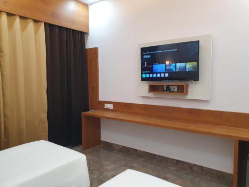 TV a/nebo společenská místnost v ubytování The Ashoka Hotels & Resorts, Panna