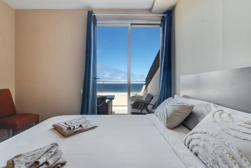 Spacious Two Bedroom Apartment with Terrace right on the Surf Beach