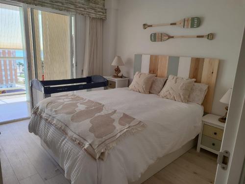 Una cama o camas en una habitación de Cullera Playa Racó