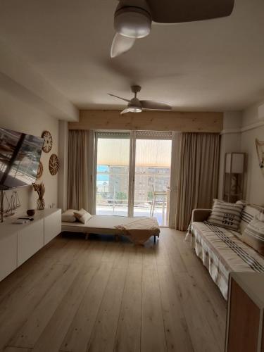 Una cama o camas en una habitación de Cullera Playa Racó