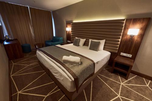 Postel nebo postele na pokoji v ubytování Puzzle Hotel Airport Frankfurt