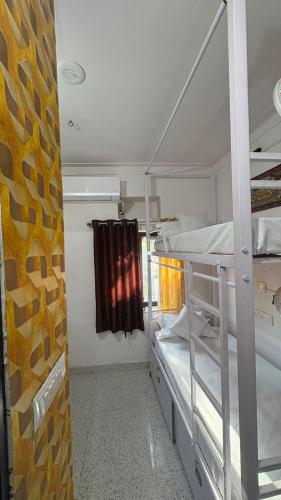Una cama o camas en una habitación de Multiple Stories, Udaipur