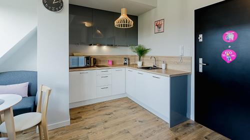 Kuchyňa alebo kuchynka v ubytovaní VacationClub - Koło Brzegu Apartament 54