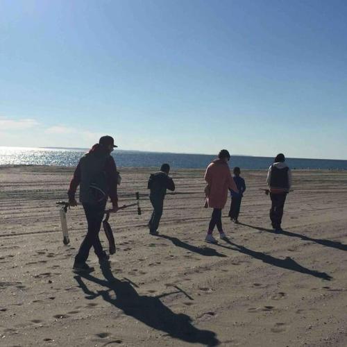 a group of people playing baseball on the beach at Private BR,BA,KIT, LR 9 Mins to Beach in Edgemere