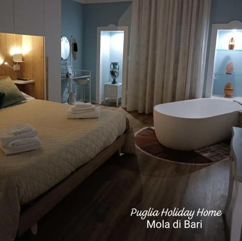 Ένα ή περισσότερα κρεβάτια σε δωμάτιο στο Puglia Holiday Home