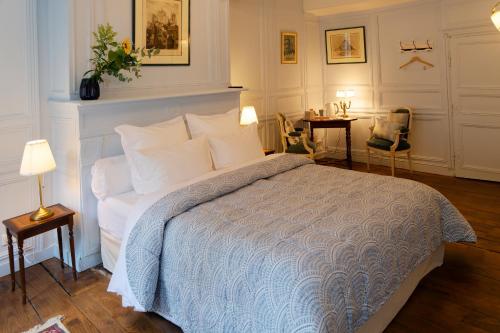 Letto o letti in una camera di Guest House Saint Yves