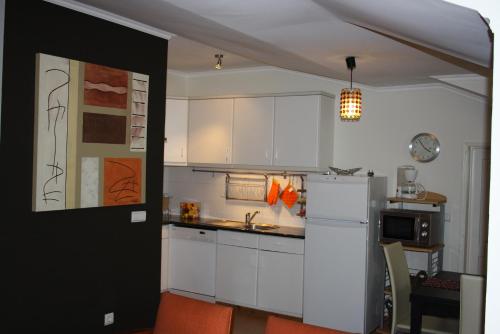 Η κουζίνα ή μικρή κουζίνα στο Apartamento Silveira