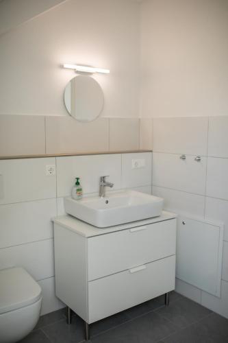 Koupelna v ubytování HUGOS Design Apartment am Waldrand - ruhig & modern