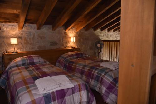 Postel nebo postele na pokoji v ubytování Agriturismo Campo del Pillo