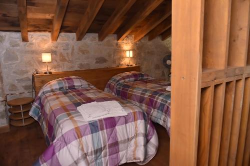 Postel nebo postele na pokoji v ubytování Agriturismo Campo del Pillo
