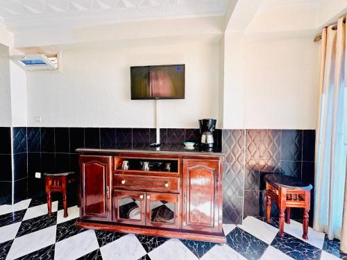 Televiisor ja/või meelelahutuskeskus majutusasutuses Mar Azul Residences Taghazout