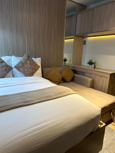Cama o camas de una habitación en El Suite
