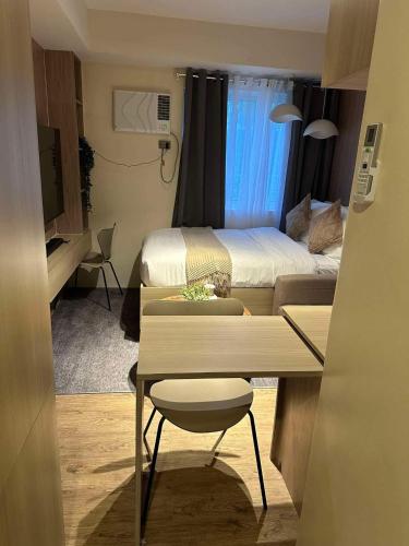 Cama o camas de una habitación en El Suite