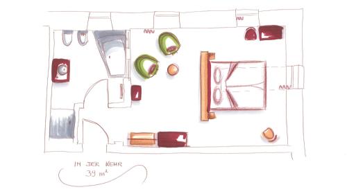 a floor plan of a room with furniture at Niedermairhof in Brunico