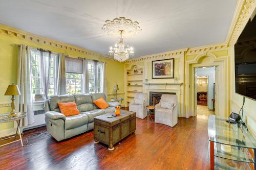 a living room with a couch and a table at Wilson Family Home Walk to Community Rec Center! in Wilson