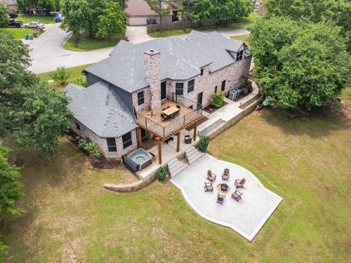 an overhead view of a large house with a roof at Shady Shores Lake House - Hot Tub Dog-Friendly in Shady Shores