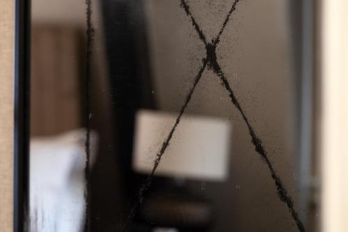 a close up of a window with a view of a monitor at Crown Street Aparthotel 2 in Halifax