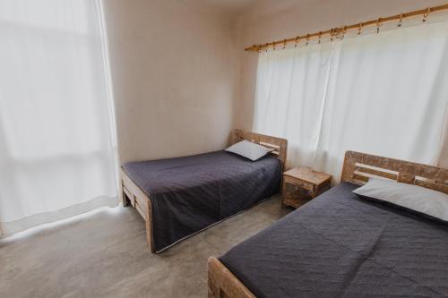 Postel nebo postele na pokoji v ubytování Apartamento Atlantic 212