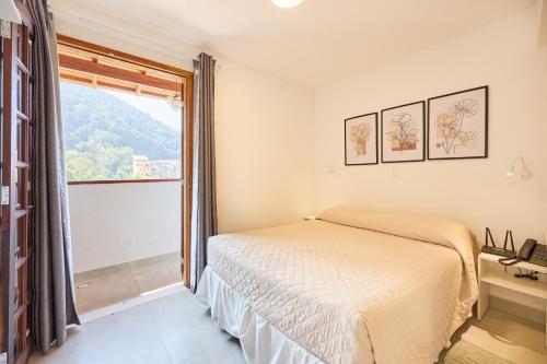Katil atau katil-katil dalam bilik di Hotel Coquille