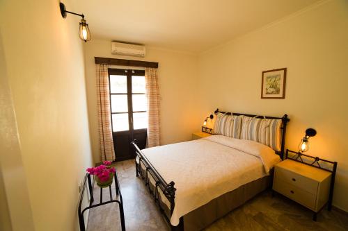 Postel nebo postele na pokoji v ubytování Hotel Porto Potha