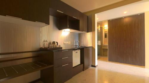 Una cocina o cocineta en Magnus Star Residency Koregaon Park Annexe