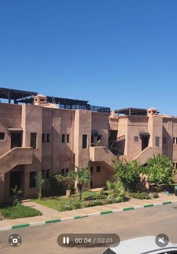 a rendering of an apartment building in the desert at Atlas golf in Marrakech