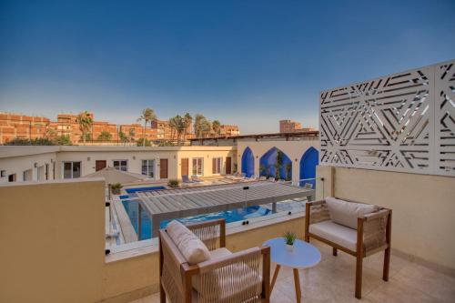 Πισίνα στο ή κοντά στο Mazar Pyramids Hotel