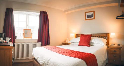 Ένα ή περισσότερα κρεβάτια σε δωμάτιο στο Mill Croft Bed and Breakfast