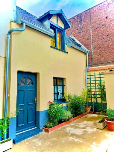 Petite maison calme limite Paris