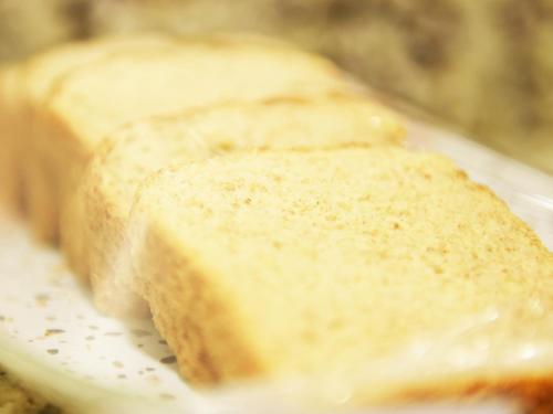 three pieces of bread sitting on a plate at Limeira Plaza Hotel in Limeira