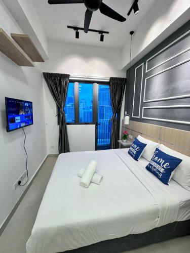 Ένα ή περισσότερα κρεβάτια σε δωμάτιο στο THE LUXE INFINITUM KLCC By KL MALAYSIA