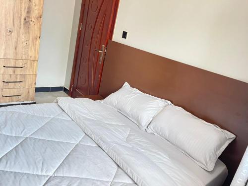 Una cama o camas en una habitación de Detail Apartment