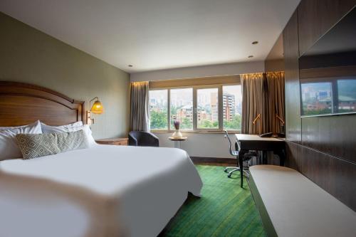 Ένα ή περισσότερα κρεβάτια σε δωμάτιο στο InterContinental Medellin - Movich by IHG