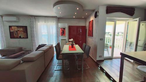 a living room with a couch and a table at Bella Vista Superior in Umag