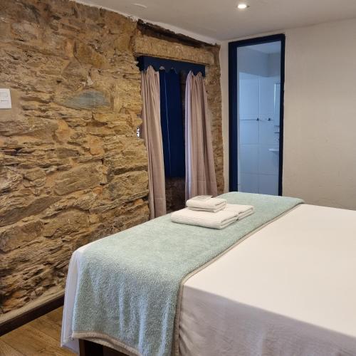 Postel nebo postele na pokoji v ubytování Hotel Barroco Mineiro
