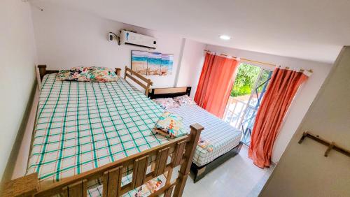 Postel nebo postele na pokoji v ubytování Casa Hotel Isabella