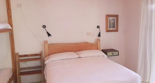 Postel nebo postele na pokoji v ubytování Namaste cabaña 02