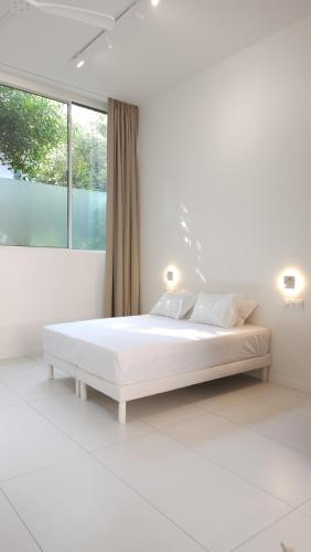 Ένα ή περισσότερα κρεβάτια σε δωμάτιο στο Loft Moderne et Lumineux