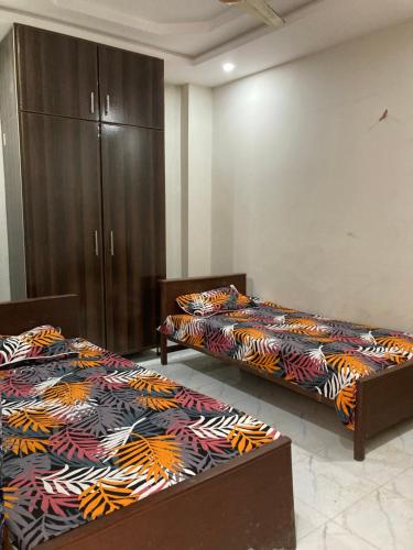 Postel nebo postele na pokoji v ubytování Furnished Flat