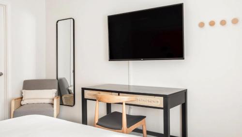TV a/nebo společenská místnost v ubytování Leland Hotel Palo Alto