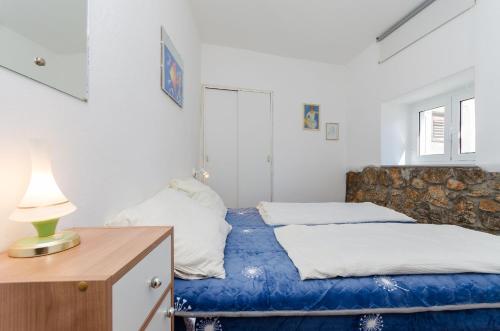 Ένα ή περισσότερα κρεβάτια σε δωμάτιο στο House Ana